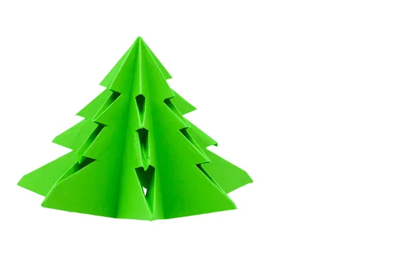 折纸圣诞树，绿色纸做的手 — 图库照片