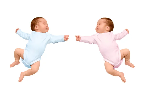 Two sleeping newborn baby identical twins, a boy and girl, — Stock Photo, Image