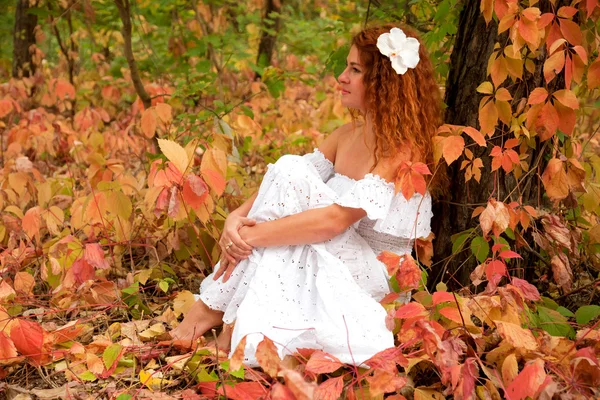 Red-haired young woman, wearing in white dress or the bride — Stock Photo, Image