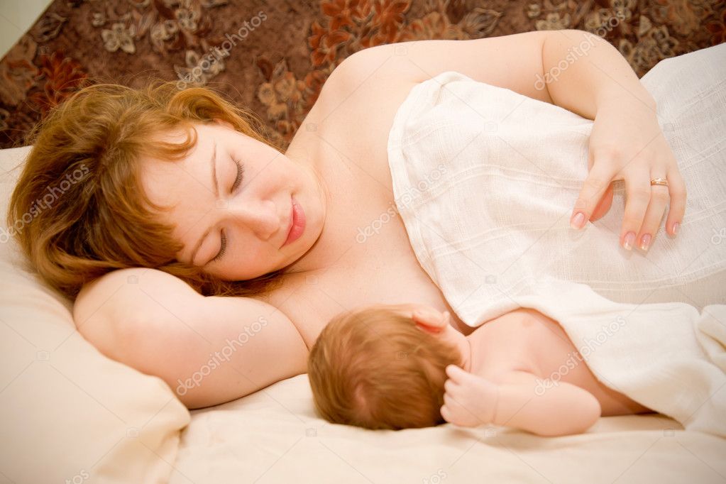 Newborn baby is breast — Stock Photo © Vitalinka #13612409