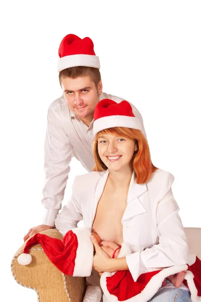 Bonne famille dans les chapeaux du Père Noël. Noël fait maison — Photo