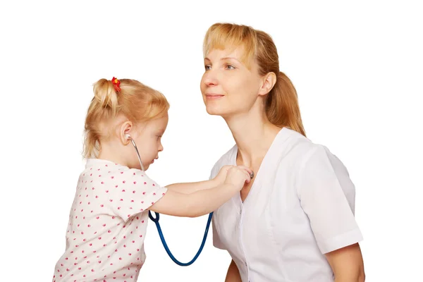 Doctor playing with child. Kid examining doctor — Stock Photo, Image