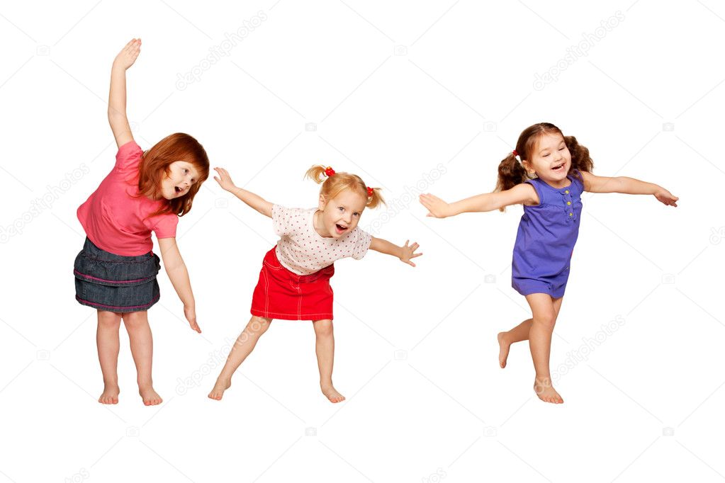Happy little children dancing. Red-haired, blonde and brunette girls. Ready for your text or logo. Joyful party. Isolated on white background.