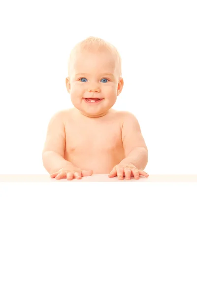 Happy smiling baby holding white board with copy space — Stock Photo, Image