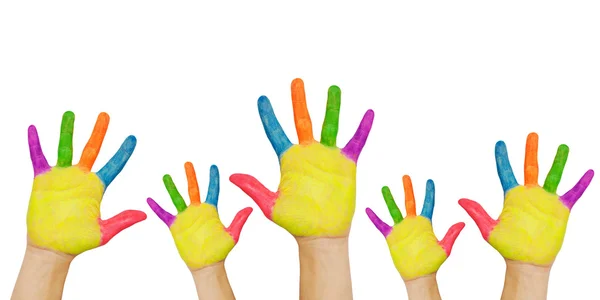 Manos pintadas levantadas. Grupos de niños en el aula . — Foto de Stock