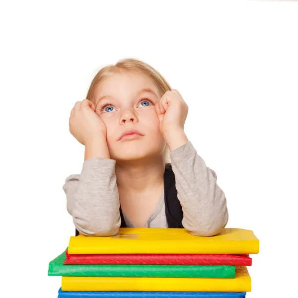 Little bored student girl with books. — Stock Photo, Image