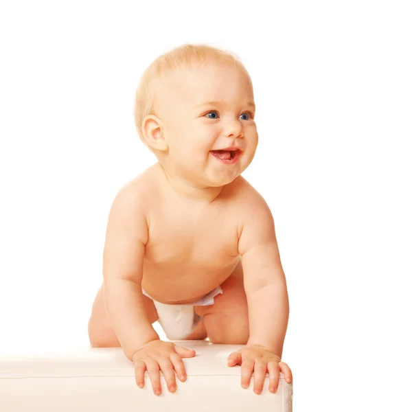 O bebé feliz está pronto para saltar. Isolado em branco — Fotografia de Stock