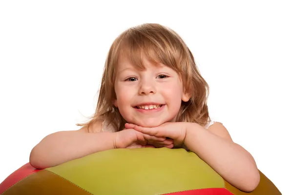 Smiling pretty child with fitness ball. Isolated on white — Stock Photo, Image