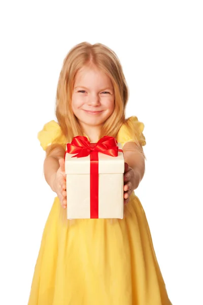 Little girl giving a gift. Holiday concept. Royalty Free Stock Photos