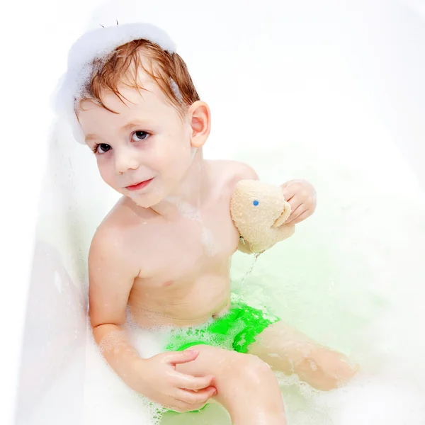 Little child washing his body with sponge — Stock Photo, Image