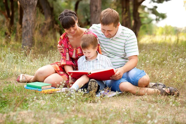 Happy family reading together.