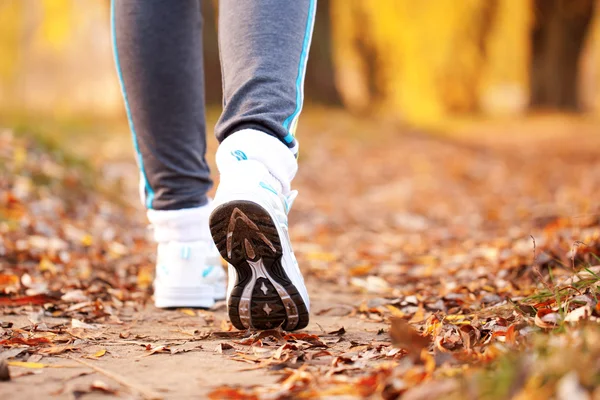 Close-up running feet outdoors. — Stock Photo, Image