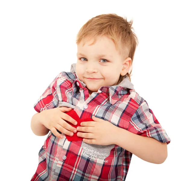 Little boembracing the red heart — Stock Photo, Image