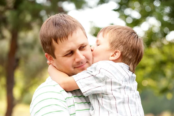 Happy father and son outdoors. — Stock Photo, Image