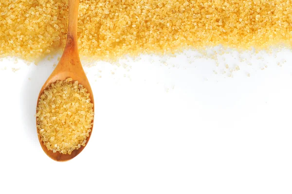 Spoon and cane sugar — Stock Photo, Image