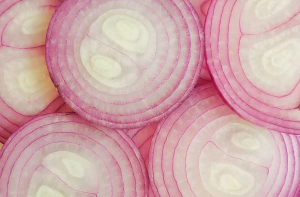 Slice of red onion, isolated Stock Picture