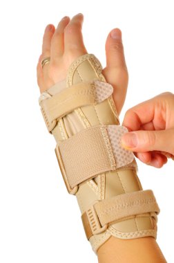 female wearing wrist brace over white background clipart