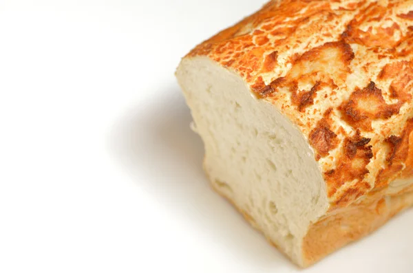 Loaf of bread with an end sliced off — Stock Photo, Image