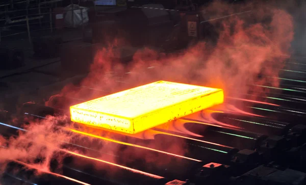 Hot steel sheet on conveyor — Stock Photo, Image