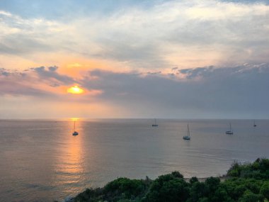 Sunset and Sunrise on the beach by the sea. orange tones