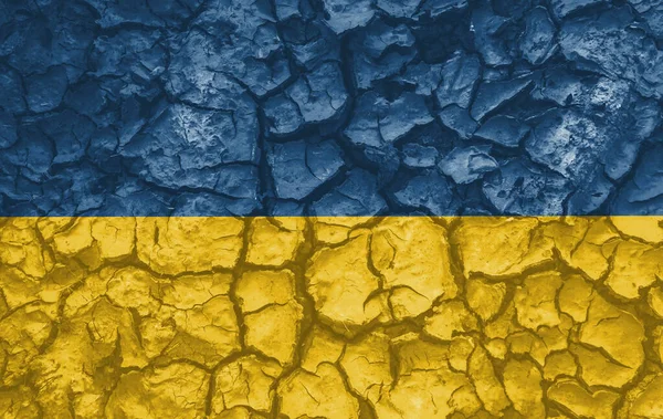 Ukrainska nationella flaggan mönster spruckna jord, krig koncept — Stockfoto