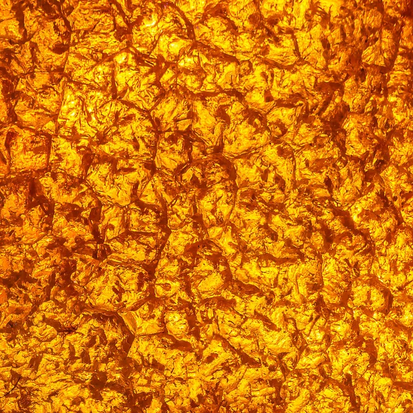 Natural amber texture. Multicolored background for advertising and banners. Vintage fossilized resin as a background. Red amber amber background. Close-up amber — Stock Photo, Image