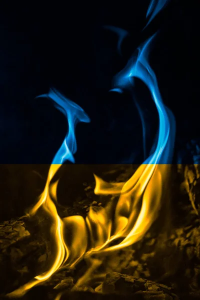 Ukrainian national flag colors with fire, war concept — Stock Photo, Image