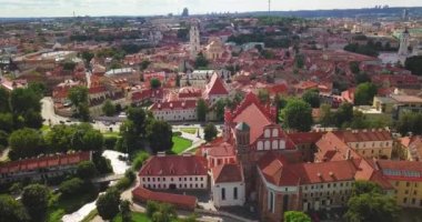 Vilnius, Lithuania. Roman Catholic Church Of St. Anne And Church Of St. Francis And St. Bernard In Old Town In Summer Sunny Day. UNESCO World Heritage ,aerial video