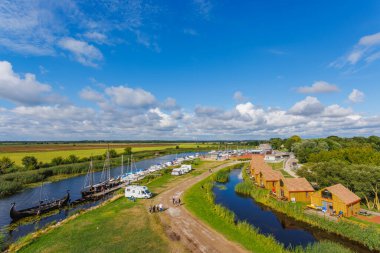 DREVERNA, LITHUANIA - AUG 08, 2022: Aerial View from the tower of Dreverna harbour. Dreverna is a village located on the Dreverna river, southwest of the village is the Curonian Lagoon