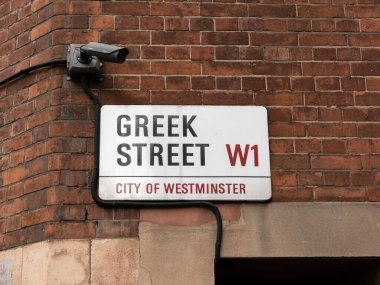 London, UK-09.10.21: Greek Street name sign, City of Westminster, London, UK