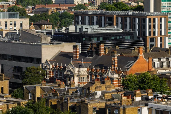 Aerial view of commercial and residential roofs of the buildings in South of London
