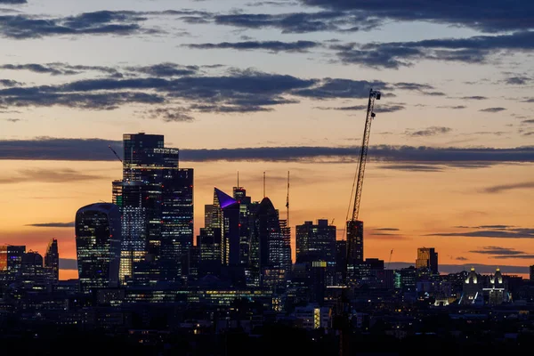 Scenic view of the City of London at the sunset as seen from the South. The City is the primary central business district of London