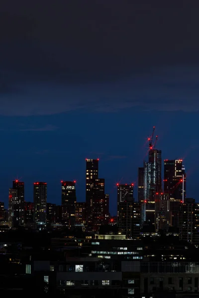 A scenic view of the residential skyscrapers in the Vauxhall district after sunset as seen from the South. Vauxhall is a district in southeast London, part of the London Borough of Lambeth, England