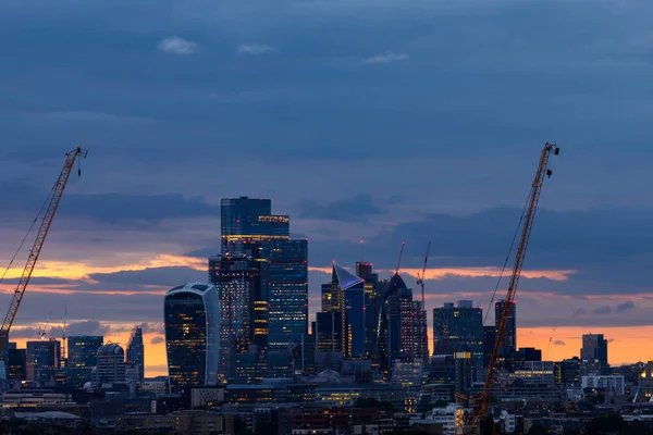 Scenic view of the City of London after the sunset as seen from the South. The City is the primary central business district of London