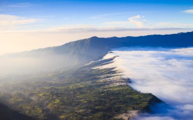 Village near cliff at Bromo Volcano in Tengger Semeru, Java, Indo clipart