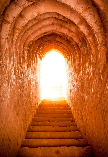 Light at end of tunnel in castle — Stock Photo, Image