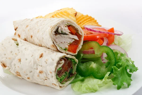 Sliced wraps and salad — Stock Photo, Image