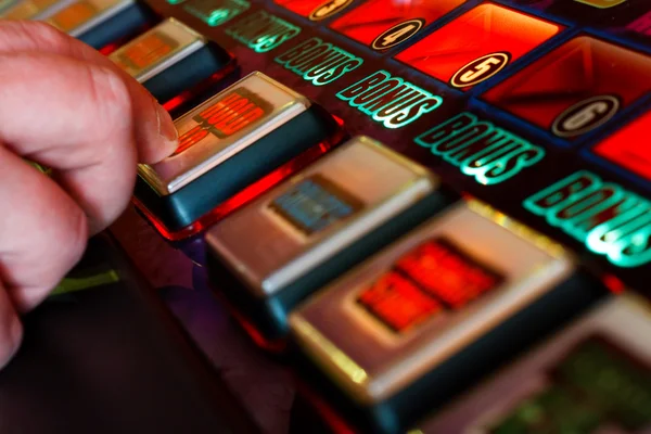 Playing the slots — Stock Photo, Image