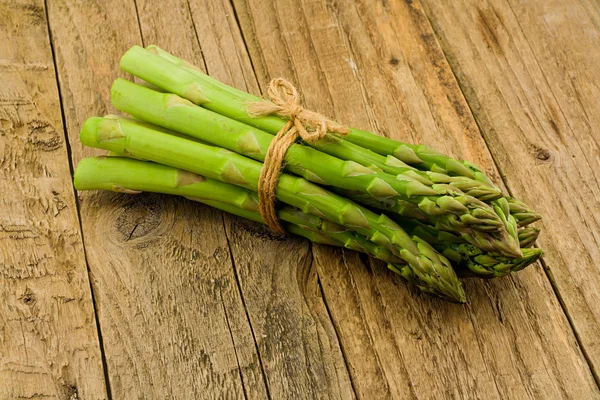 Asparagus rustic wooden table — Stock Photo, Image