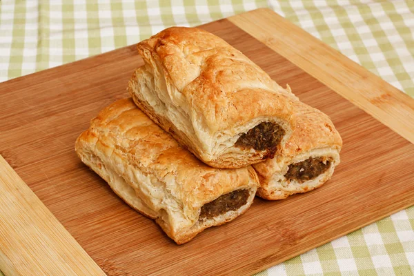 Sausage roll kitchen setting — Stock Photo, Image