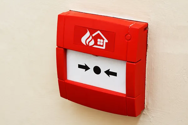 Fire alarm button on wall — Stock Photo, Image