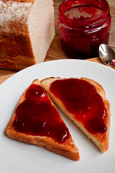 Mixed fruit jam on toast — Stock Photo, Image