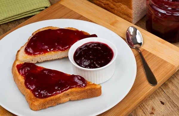 Mixed fruit jam on toast — Stock Photo, Image