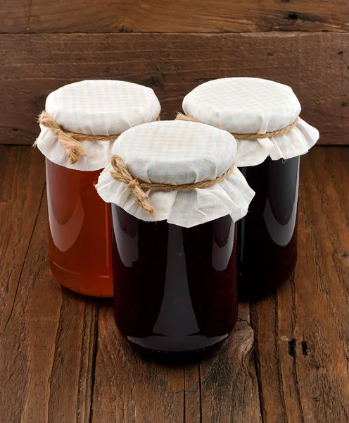 Set of three conserve jars — Stock Photo, Image