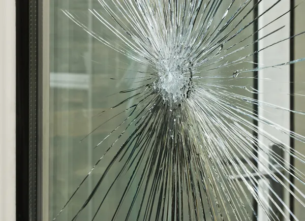 Smashed glass window pane — Stock Photo, Image