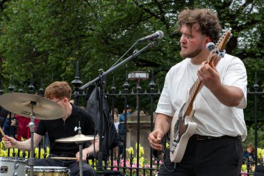 High Fade band performs on Princes Street during Edinburgh Festival Fringe 2022- 5 Aug-29 Aug, Edinburgh UK. Actors of street theater and musicians in capital of Scotland. Art on the street 