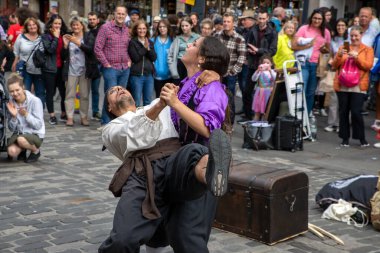 Edinburgh Festival Fringe 2022-5 Aug-29 Aug Edinburgh UK. Performers on the street. Actors of street theater and musicians in capitol of Scotland. A comedy actors perform on the Royal Mile. 