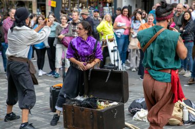 Edinburgh Festival Fringe 2022-5 Aug-29 Aug Edinburgh UK. Performers on the street. Actors of street theater and musicians in capitol of Scotland. A comedy actors perform on the Royal Mile. 