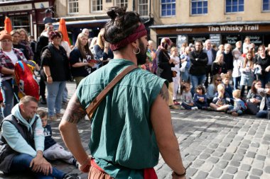 Edinburgh Festival Fringe 2022-5 Aug-29 Aug Edinburgh UK. Performers on the street. Actors of street theater and musicians in capitol of Scotland. A comedy actors perform on the Royal Mile. 