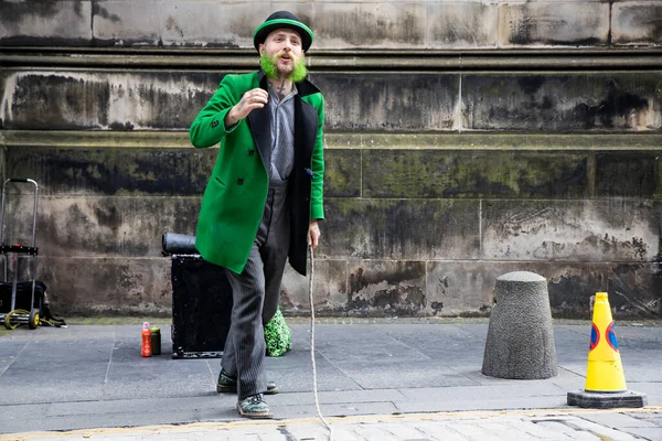 Edinburgh Festival Fringe 2022-5 Aug-29 Aug Edinburgh UK. Performers on the street. Actors of street theater and musicians in capitol of Scotland. A comedy actor performed on the Royal Mile.